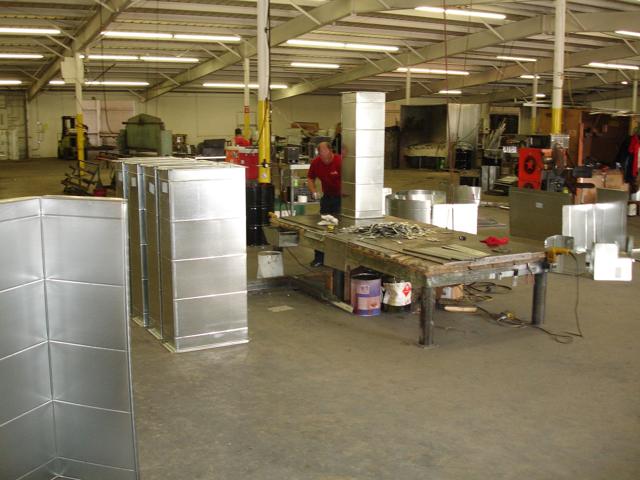 Rectangular duct sections being assembled