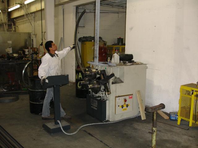 Fabricator at machine